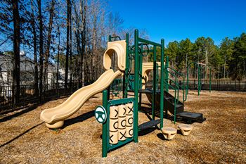 a playground with slides at a park